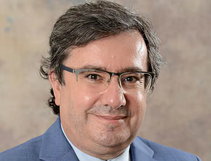 Prof.
